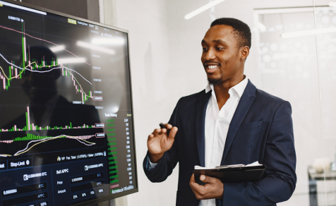 Man giving live expense demo on computer screen
