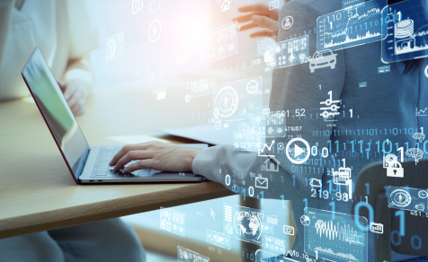 Employee on computer assessing need for Foundational Data Model